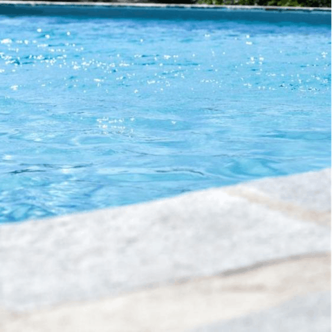 Dive into the communal swimming pool for a refreshing swim