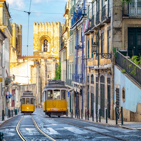 Wind through Lisbon's ancient streets on the iconic 28 tram—the stop is just minutes from your front door