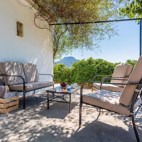 Appreciate the region's tranquillity while sat beneath the leafy pergola