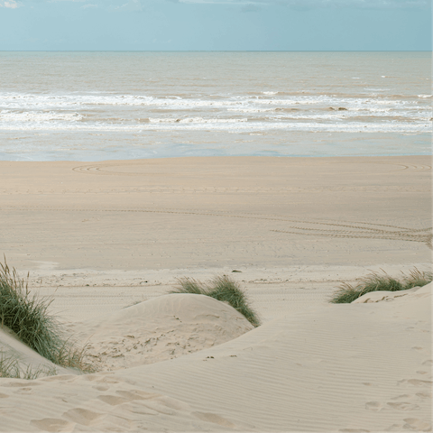 Spend the day at beautiful Camber Sands, a twenty-five-minute drive from this home