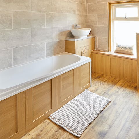 Enjoy a relaxing soak in the tub after spending a day at the beach