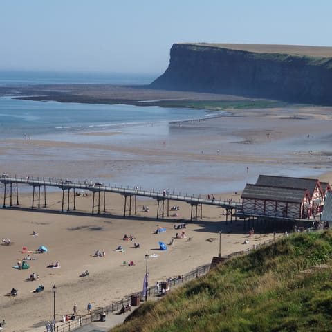 Take the oldest functioning cliff lift in the UK down to the pier