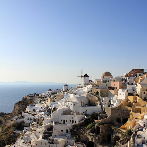 Stay near to Santorini's coast, famed for its rugged landscape dotted with white homes