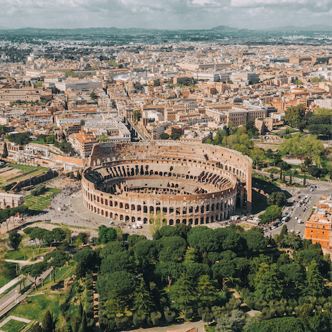 Visit the Colosseum, a seven-minute walk away