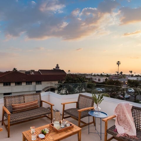 Have a sunset aperitifs on the roof