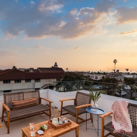 Have a sunset aperitifs on the roof