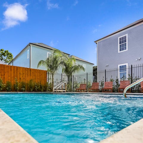 Cool off from the heat in the shared swimming pool