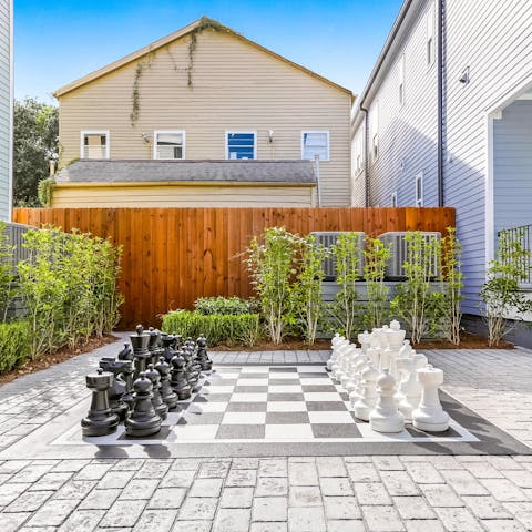 Play a game of giant chess under the Louisiana sun