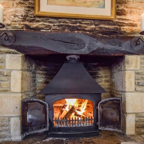 Get cosy around the wood-burning stove on chilly evenings