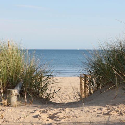 Spend the day at Hollywell Bay, a five-minute drive away