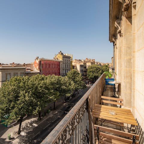 Enjoy a drink out on the balcony with fantastic views of the Bordeaux skyline before you 