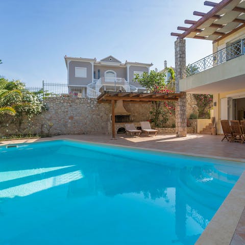 Cool off in the heat of the day in the rectangular swimming pool