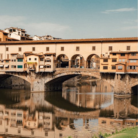 Take the ten-minute stroll towards the river and walk across Ponte Vecchio