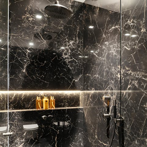 Get ready in the marble bathroom for a Parisian night out