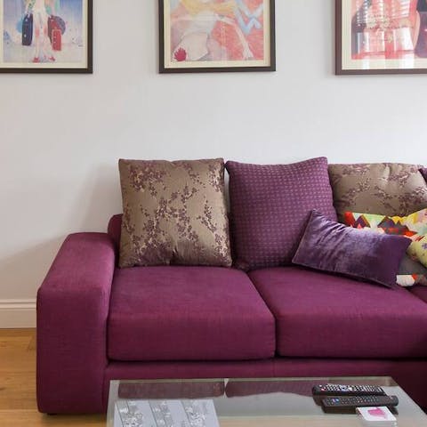 Relax on the deep purple sofa