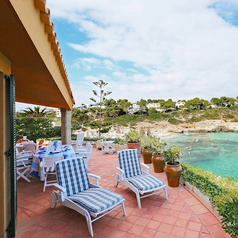 Sunbathe on the terrace overlooking the sea