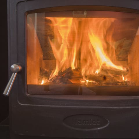 Get a fire crackling in the wood-burning stove to keep things cosy