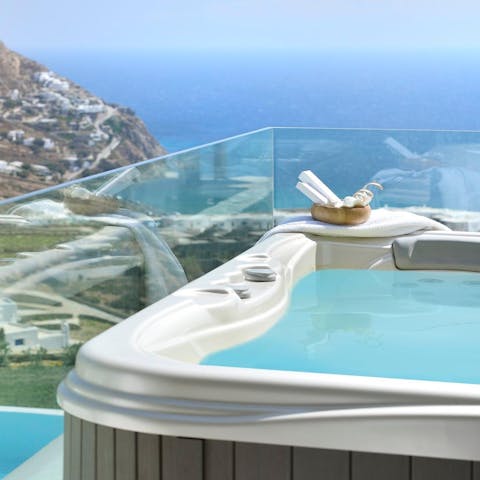 Admire the sea view as you soak on the hot tub