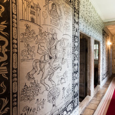 Try and decipher the stories from the tapestries on the walls