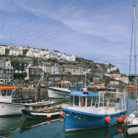 Explore beautiful Mevagissey harbour, under a five-minute stroll away