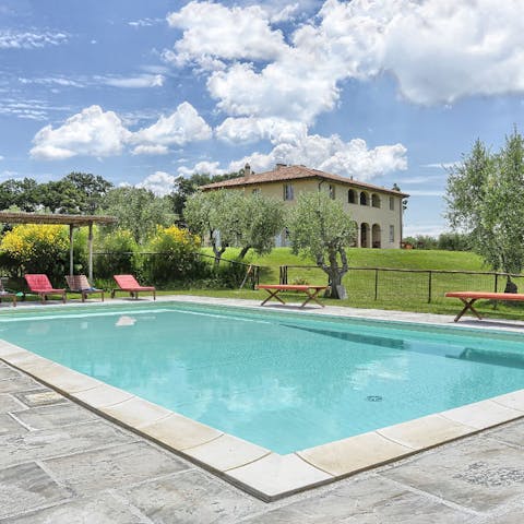 Enjoy the warm Italian sun by the pool