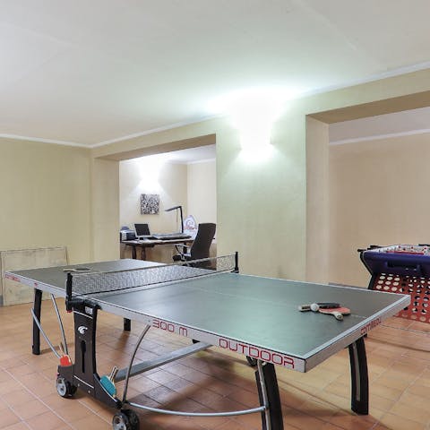 Let the kids play table tennis and foosball in the games room