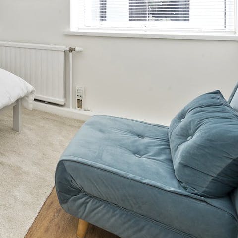 Find space for a little one with the single sofa bed in the main bedroom
