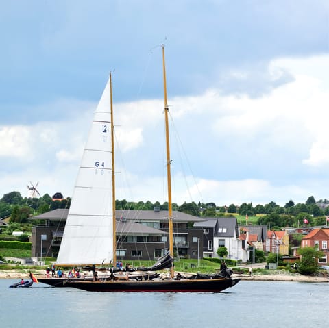 Watch the boats sail by from Sønderborg's waterfront, just twenty minutes away