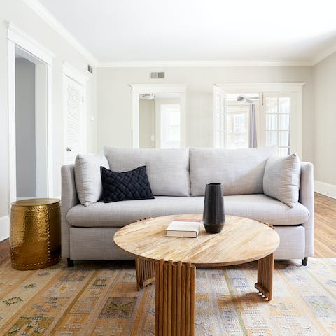 Kick off your cowboy boots and rest tired feet on the cosy sofa