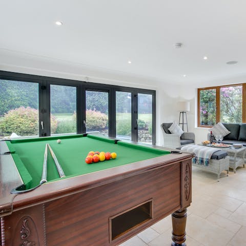 Challenge your friends to a pool tournament in the fun-filled games room