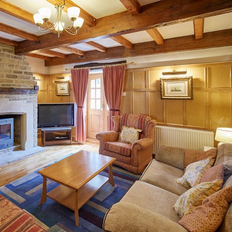 Curl up in the cosy living room with a cup of tea and a biscuit or two