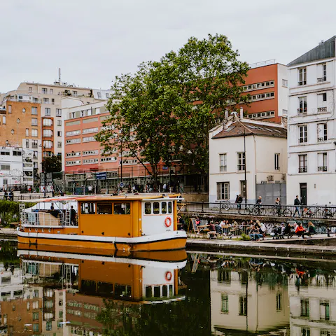 Stroll along the bars, boutiques and restaurants that line Canal Saint-Martin, just a three-minute walk away