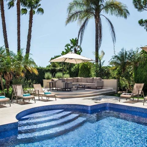 Relax and unwind around the ample pool