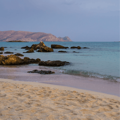 Stroll down to Livadia Beach and walk along the coast