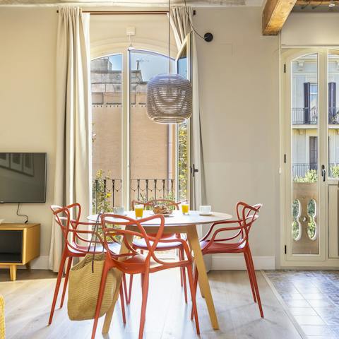 Set the bright and stylish dining table for a meal together