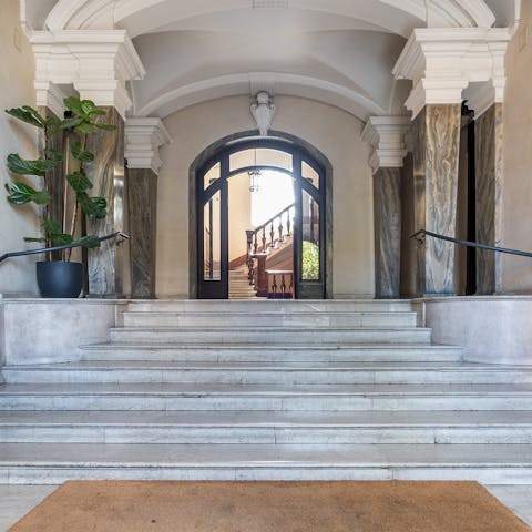 Ascend the elegant marble steps into your historic home