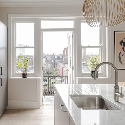 Gaze out over the neighourhood from the kitchen balcony
