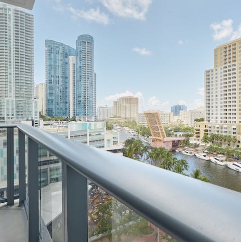 Enjoy a cool drink on the private balcony at the end of a long day