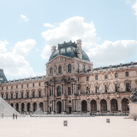 Take a carefree walk down to the iconic Louvre Museum