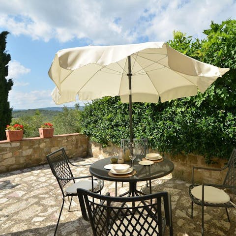 Savour a glass of local wine on the private patio