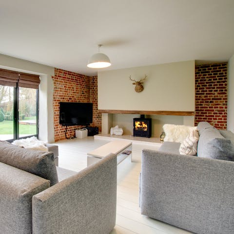 Throw a log on the fire and cosy up for a movie night in the lounge