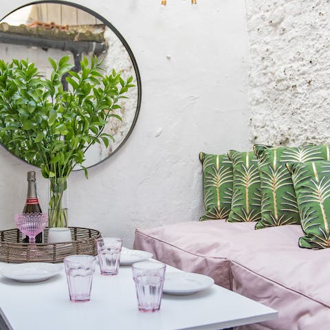 Enjoy a home-cooked dinner and a few glasses of wine in the super-chic courtyard on warmer nights