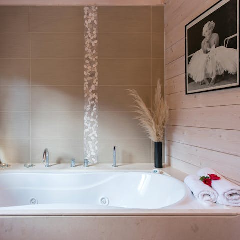Unwind after a long day with a soak in the whirlpool tub