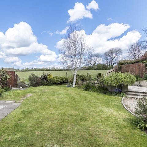 Make the most of the vast lawn overlooking the countryside 
