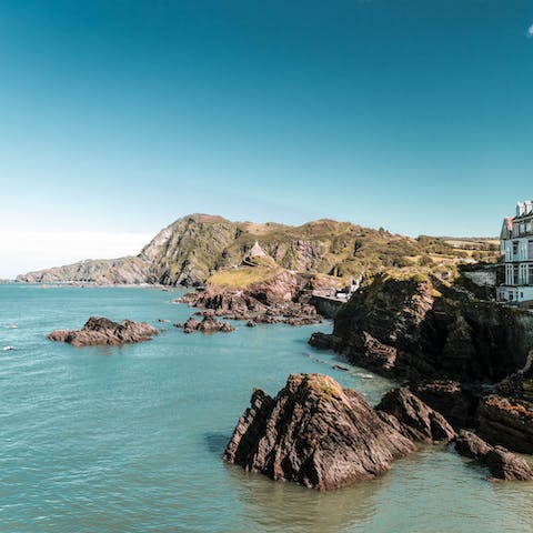 Take a walk along Ilfracombe's coastal paths to explore the rugged coves 