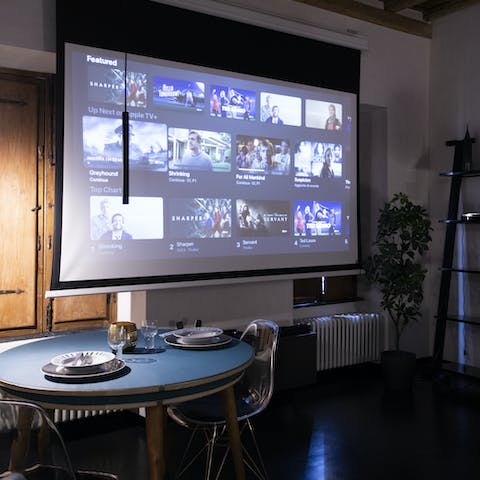 Pull down the projector screen for a movie night like no other