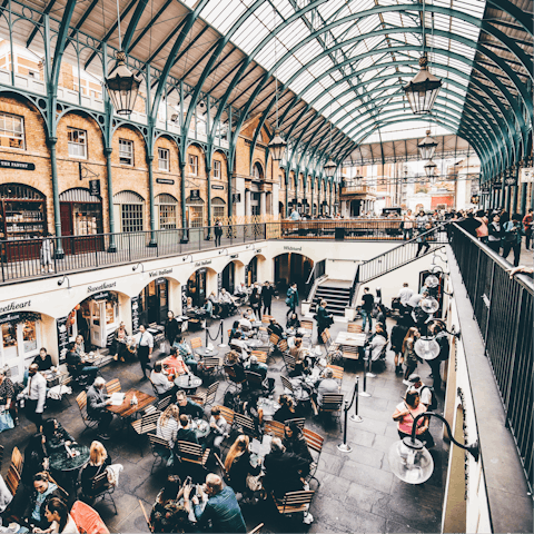 Explore Covent Garden's upscale eateries and luxe boutiques, a three-minute walk away