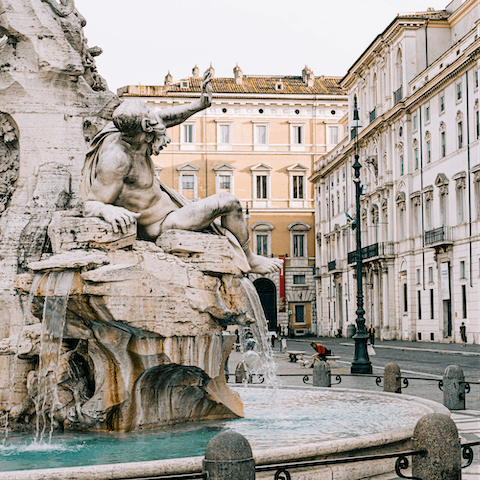 Visit the famous fountains in Piazza Navona, a five-minute walk away
