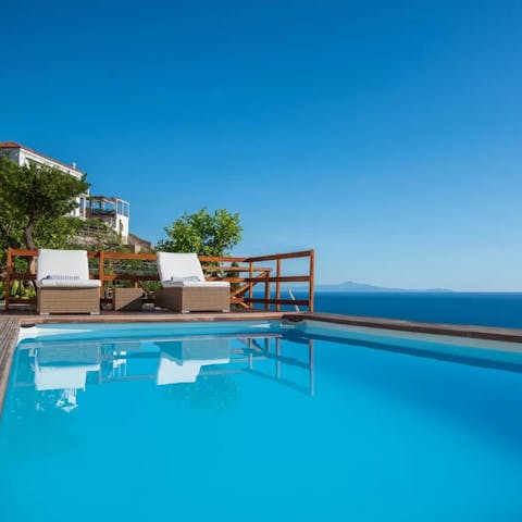 Work on your tan from the pool's waters or from the perfectly placed loungers