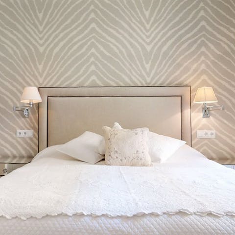 Retreat to the bright and stylish main bedroom when you crave a bit of privacy